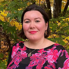 Woman with leaf jewelry.