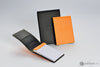 Rhodia Pad Holder in Orange with Graph Pad with Pen Loop - 4.5 x 6.25 Notepad