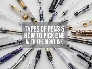 Various demonstrator fountain pens set in a radial pattern.