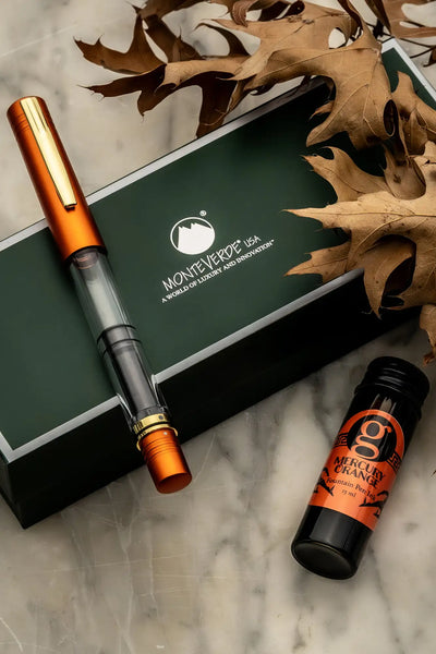 Orange and black fountain pen with a sleek design, featuring monteverde branding.