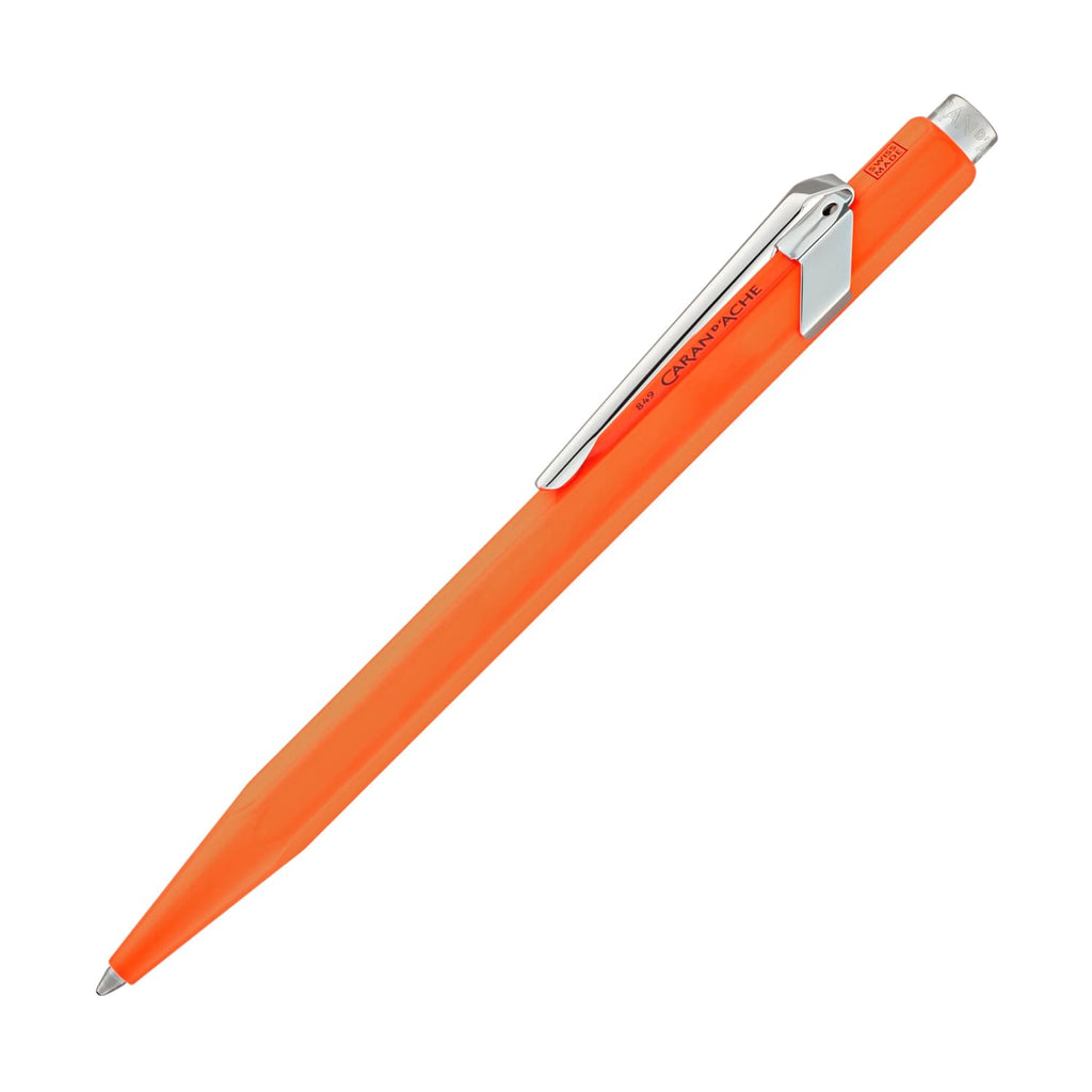 Caran d'Ache 849 Metal Collection Ballpoint Pen in Fluorescent Orange -  Goldspot Pens