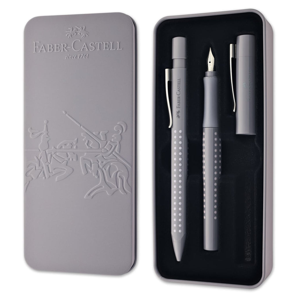 https://goldspot.com/cdn/shop/products/faber-castell-grip-harmony-fountain-and-ballpoint-pen-in-dapple-grey-gift-tin-821_1024x1024.jpg?v=1624329087